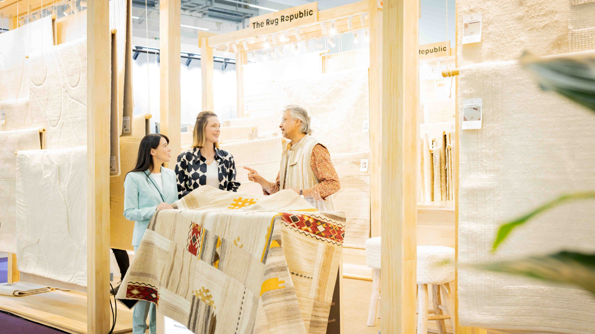 Customers in a sales talk in a carpet showroom