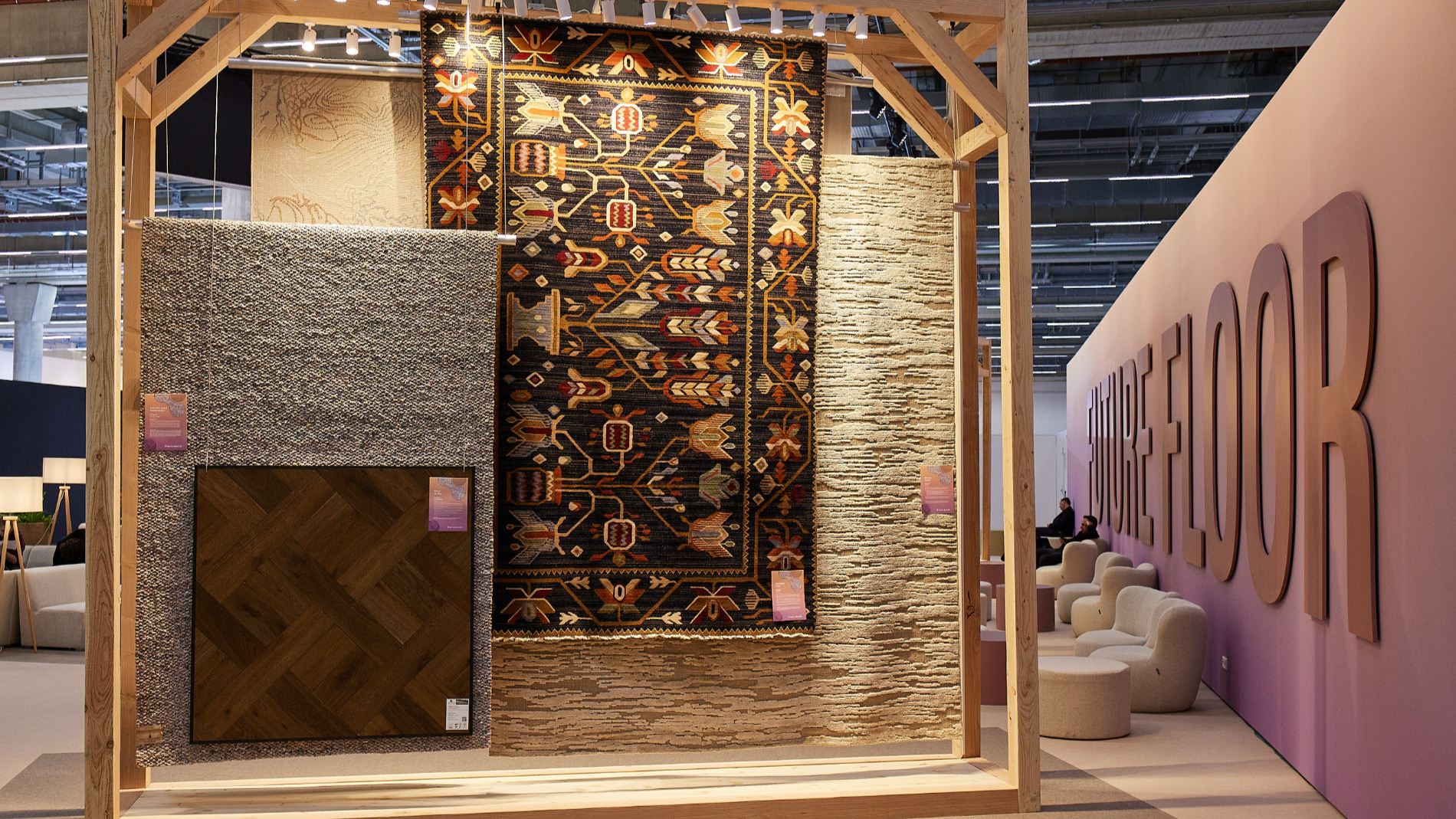 Display of various carpet and flooring samples in a wooden frame