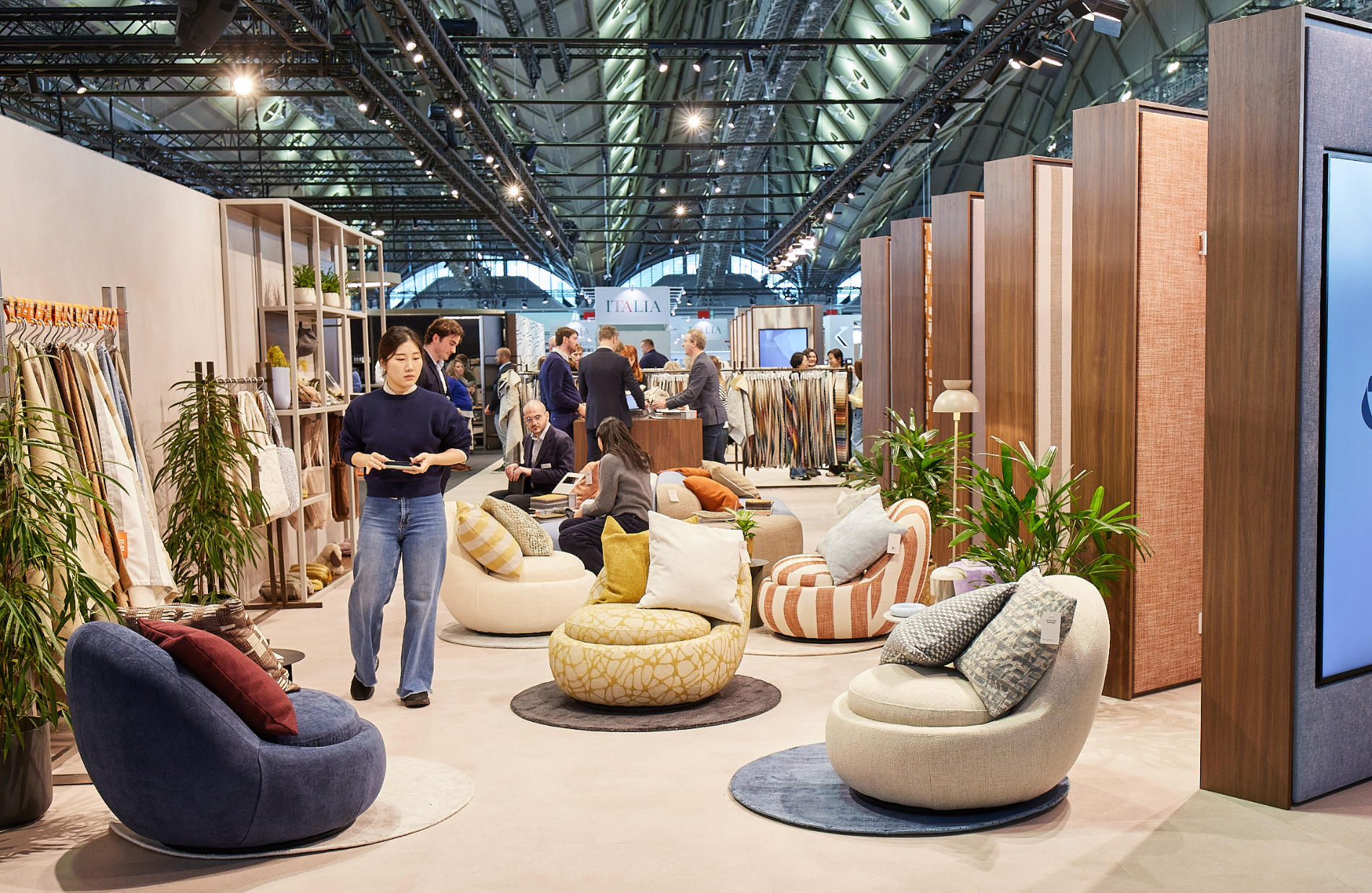 Woman is looking at fabrics