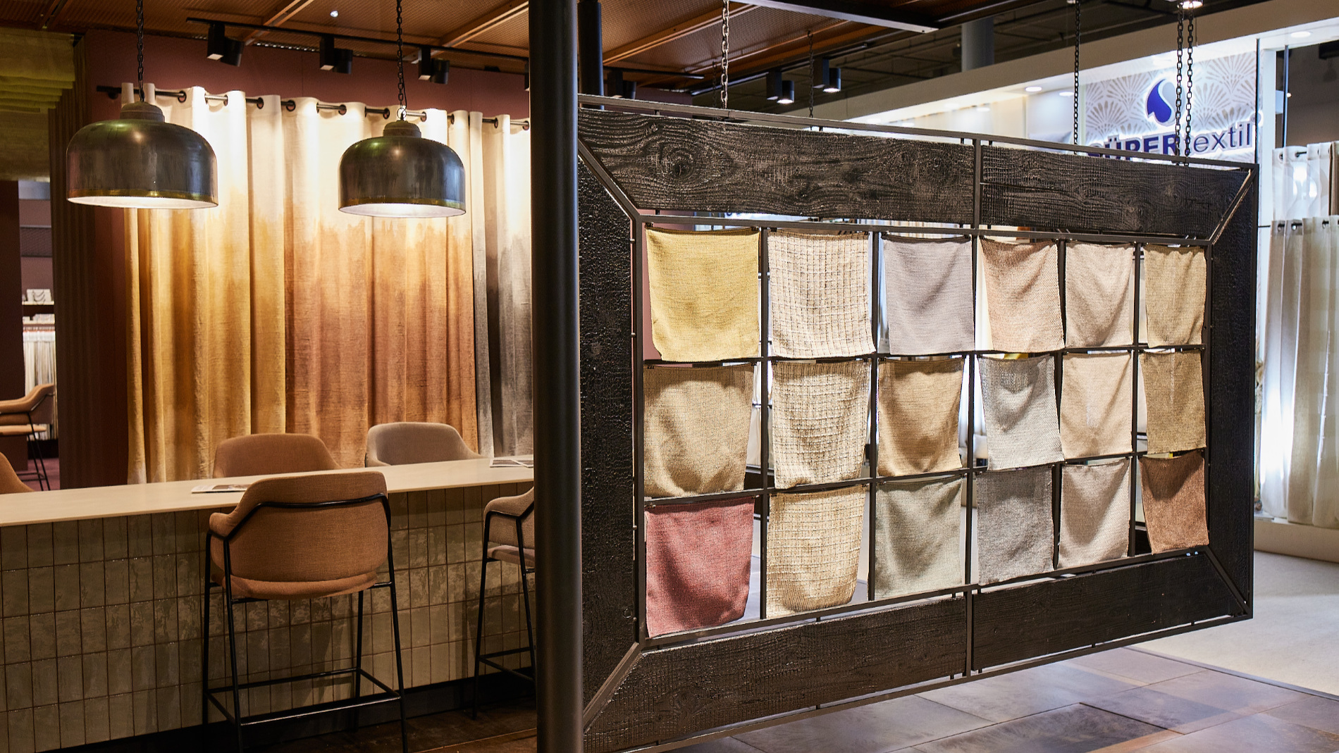 A trade fair stand displaying home textiles