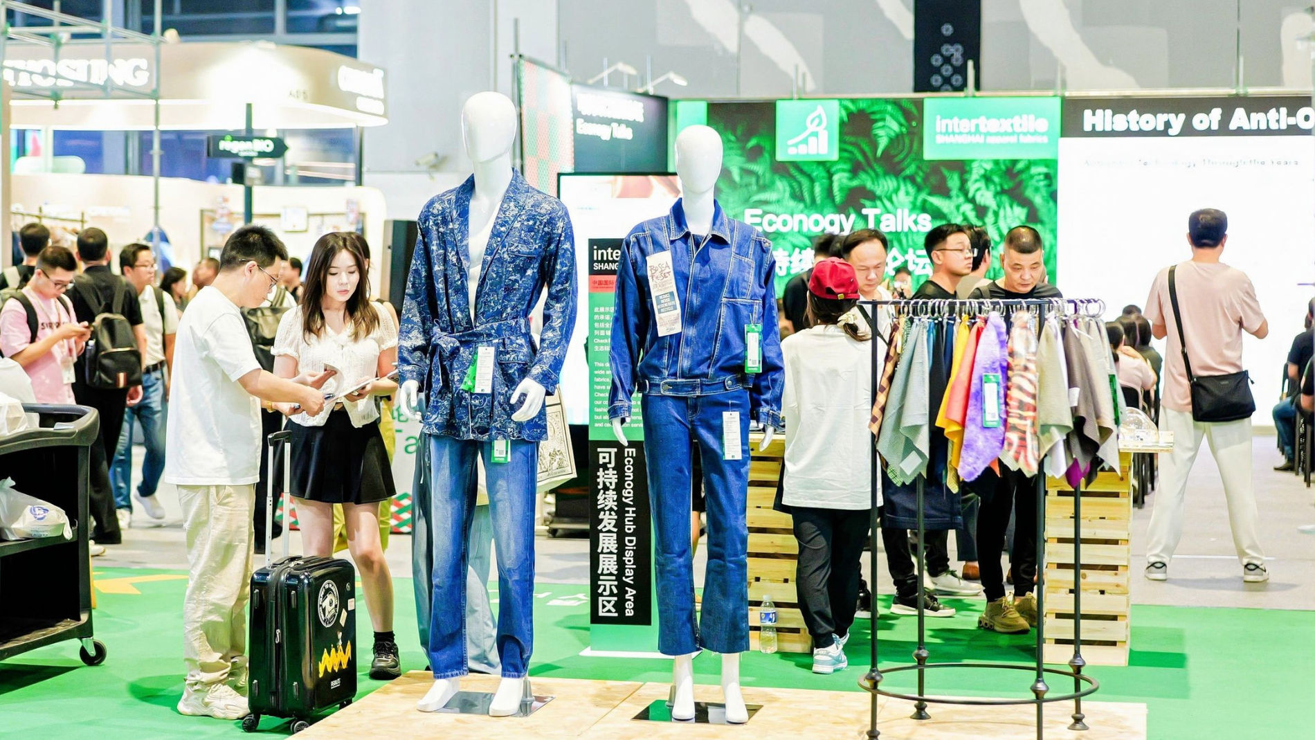 Exhibition of fashion dolls with clothing at a trade fair